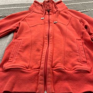 Pink zip up jacket from mondetta size small